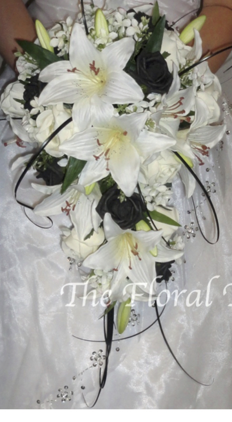 Black and white Tiger lily and rose wedding shower bouquet